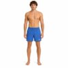 Speedo בגד ים לגבר בצבע כחול, מראה את המודל עומד בפוזה ישרה.